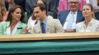 Roger Federer with Catherine, Princess of Wales, and Mirka Federer in Center Court's Royal Box