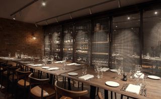 Dining area in Canto Corvino restaurant — London, UK