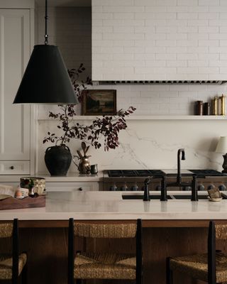 neutral kitchen with large pendant