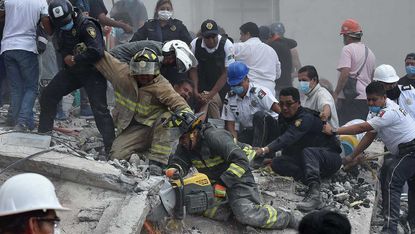 Rescue workers and residents team up to search for survivors in Mexico City