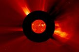 This image from the SOHO space observatory shows the M9.3 flare (fairly strong-sized) along with a coronal mass ejection (CME) as it blasted out from the sun and headed in the general direction of Earth (Aug. 4, 2011). The eruption is visible in the lower right.