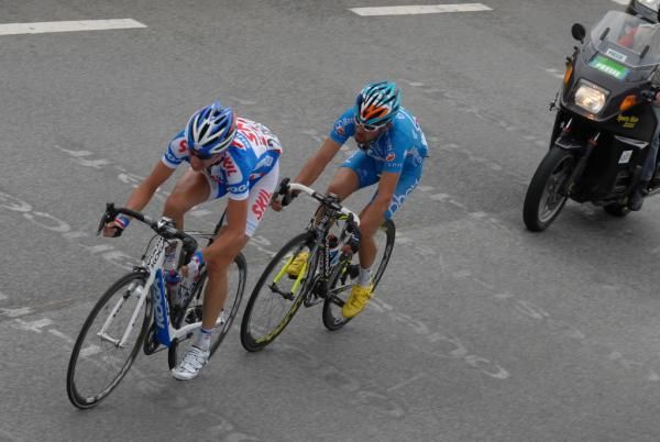 Alexandre Geniez (Skil-Shimano) and Anthony Charteau (Bbox-Bouygues Telecom) cross the start-finish line