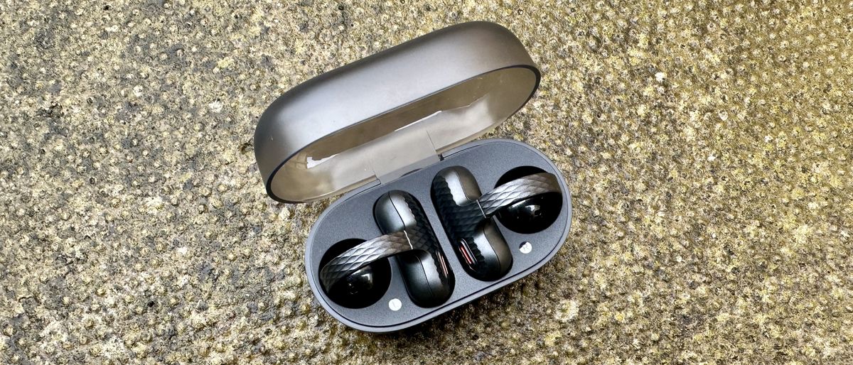 The Amazfit Up open ear buds in their charging case