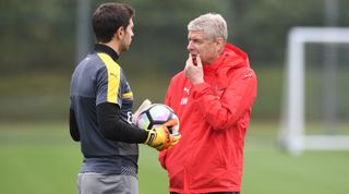 Arsenal manager Arsene Wenger with Emiliano Martinez before a training session at London Colney on May 6, 2017 in St Albans, England.