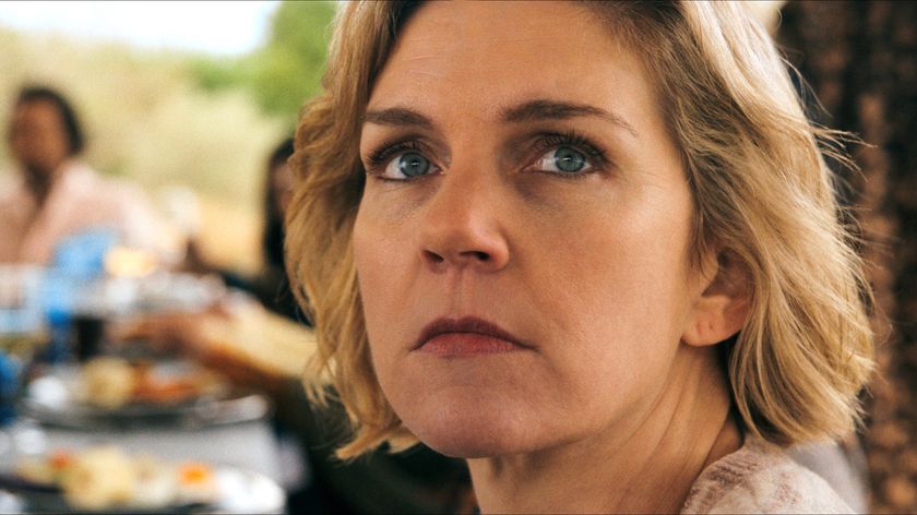 Carol (Rhea Seehorn) looks towards the camera in a scene from Apple TV&#039;s &quot;Pluribus&quot;