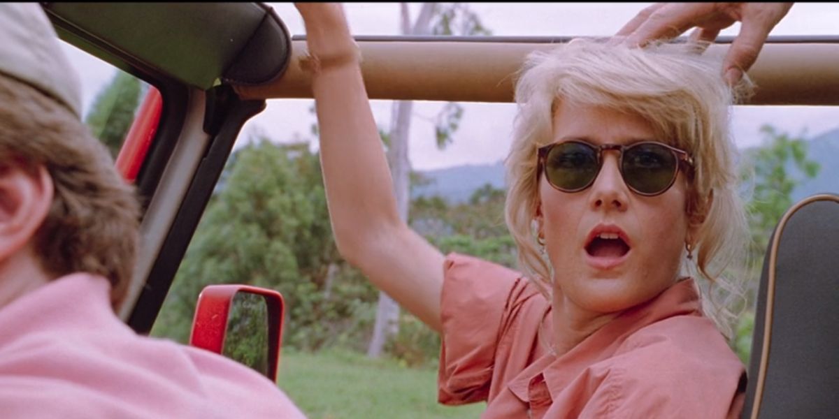 Laura Dern looking shocked in Jurassic Park