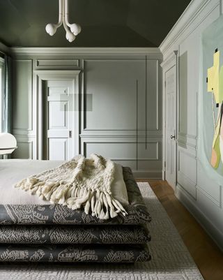 green bedroom with dark ceiling by Jen Talbot Design