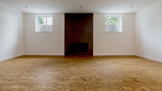 What to do if your basement is too humid: immage shows basement and cork floor