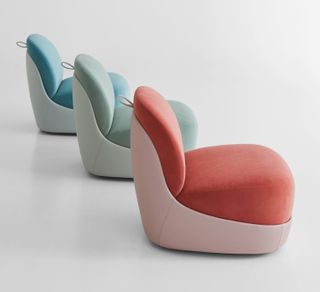 Side view of three chairs in light blue, mint green and pink, presented by Bernhardt design at ICFF 2021