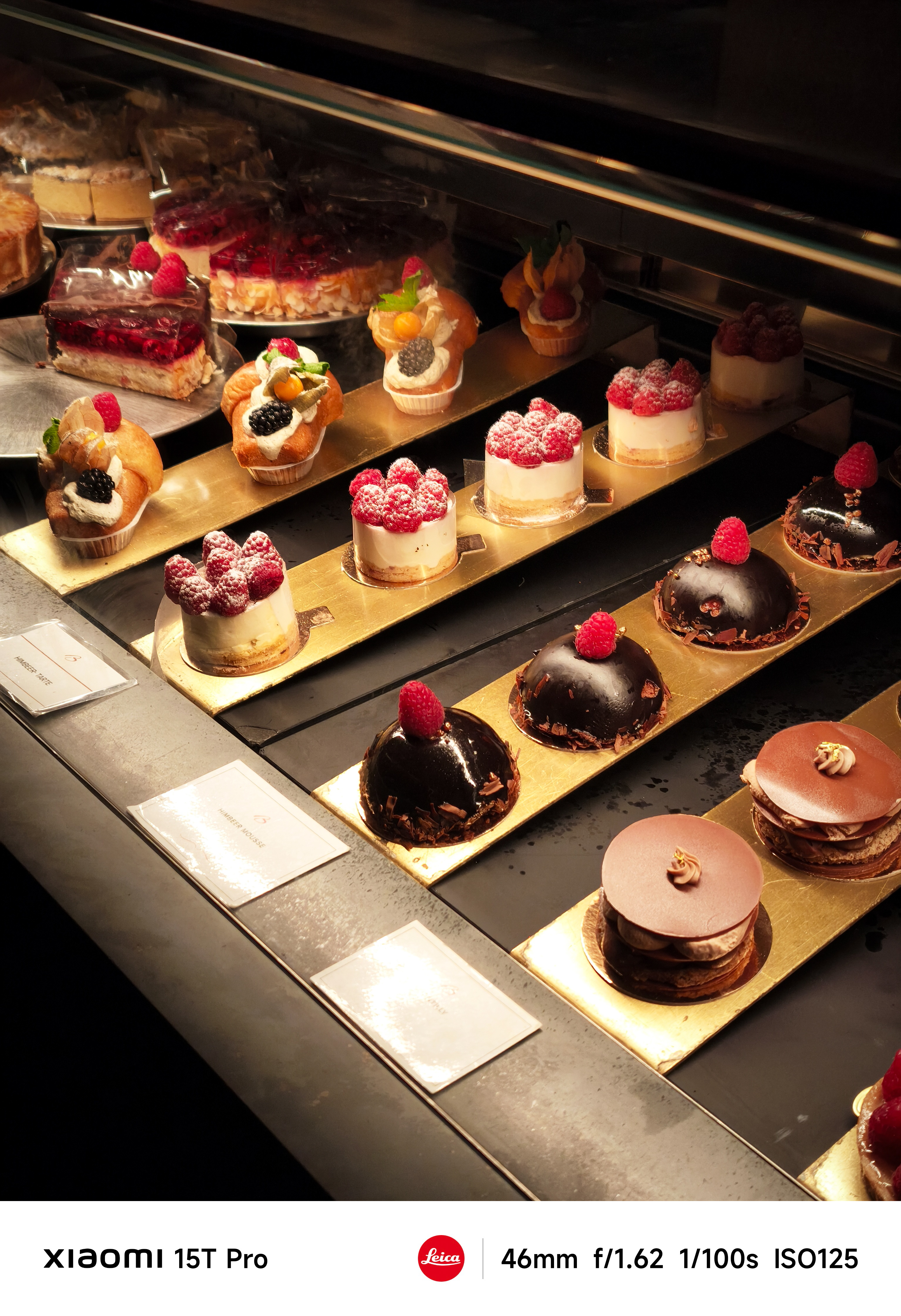 Cakes lined up in a delicatessen