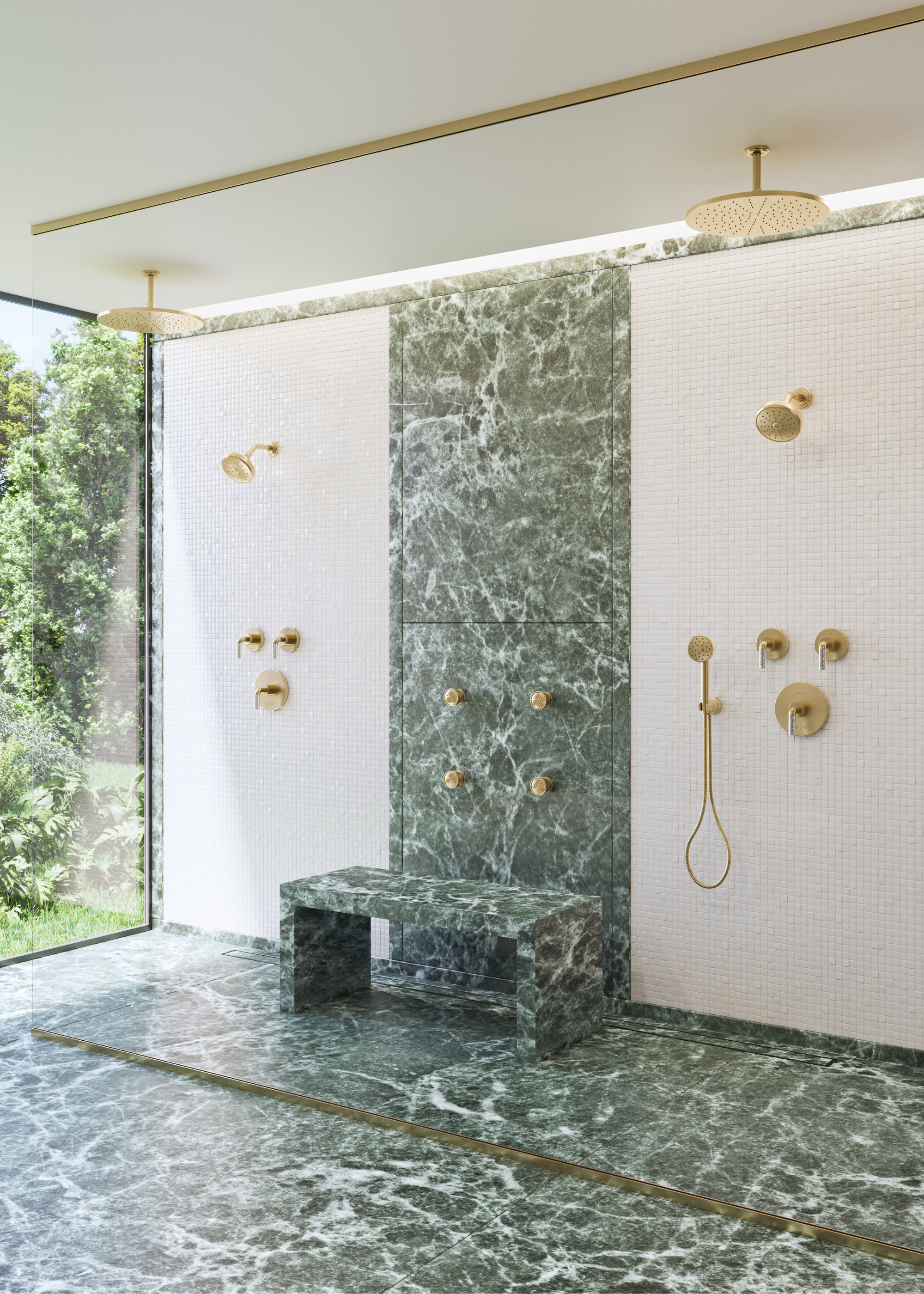 a double shower with green marble and multiple shower heads and a marble bench