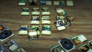 Arkham Horror: The Card Game promo image with cards on a wooden surface