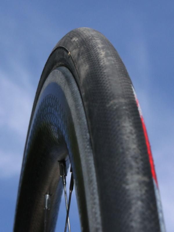 The wider rim is optimized for more realistic tire sizes. Larger radius edges reduce the occurrence of pinch flats