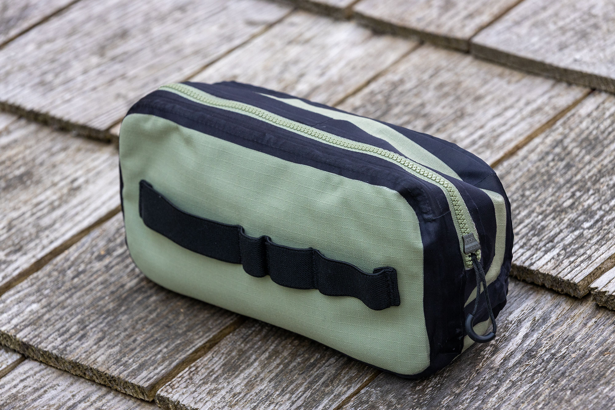 Rapha Explore Bar Bag turned inside out to show taped seams and elastic webbing strip