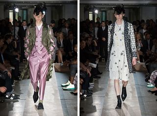 Males models walking the runway wearing pink and camo suit and white with black patterned suit from the Comme des Garcons Homme SS2015 Collection