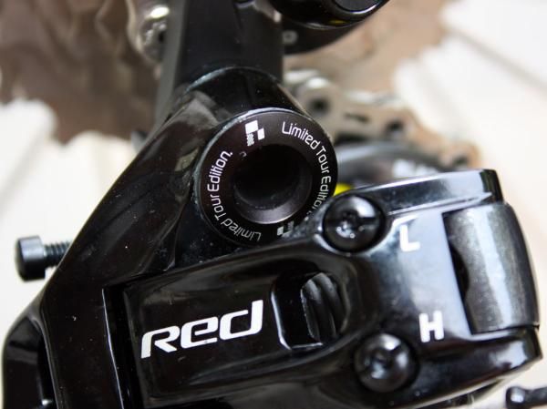 The rear derailleur mounting bolt gets unique laser etching.