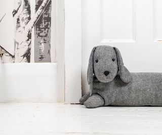 Draft excluder as a dog
