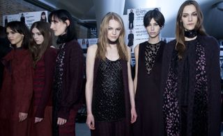 six female models in dark coloured clothing by pringle of scotland