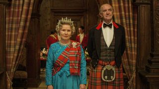 Imelda Staunton as Queen Elizabeth II and Jonathan Pryce as Prince Philip wearing kilts and Scottish regalia in The Crown season 5