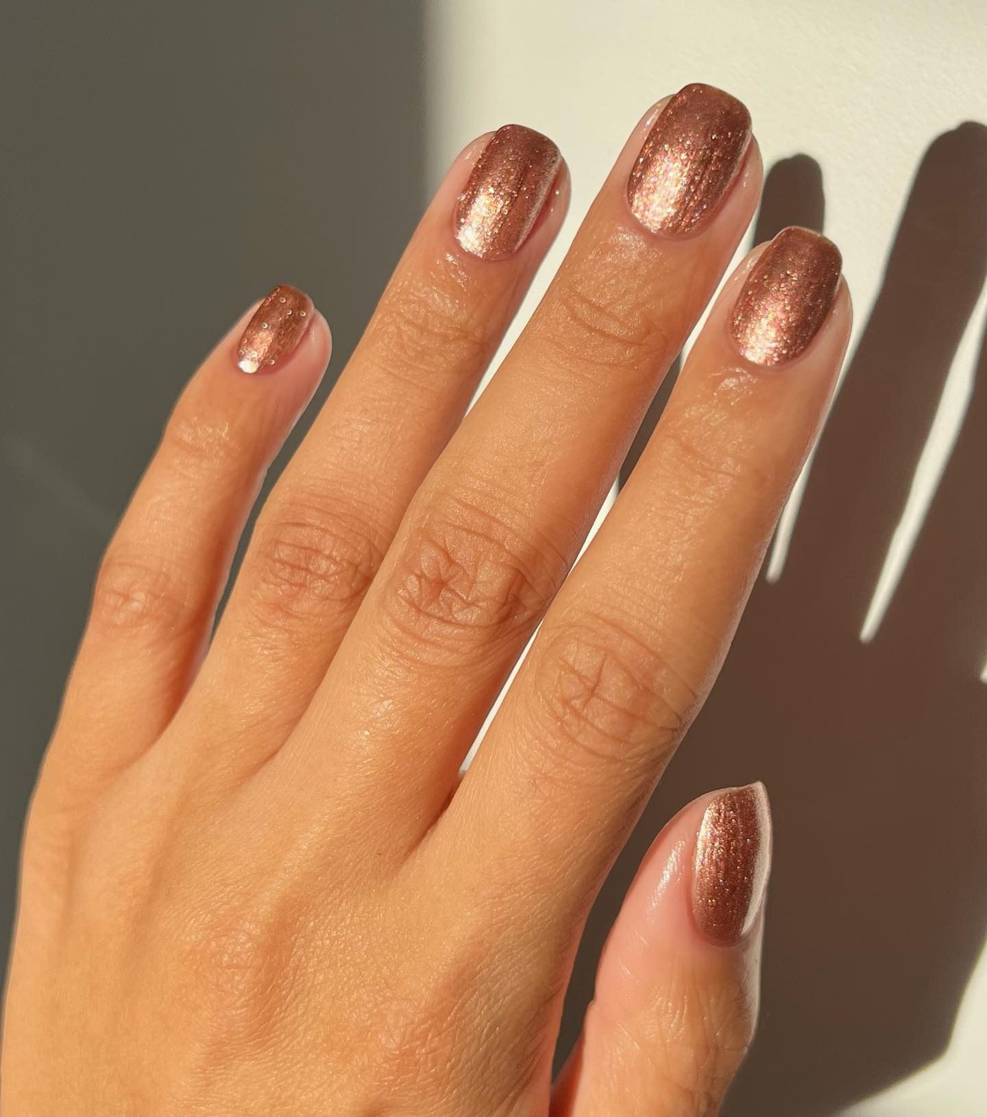 Frosty neutral nails.