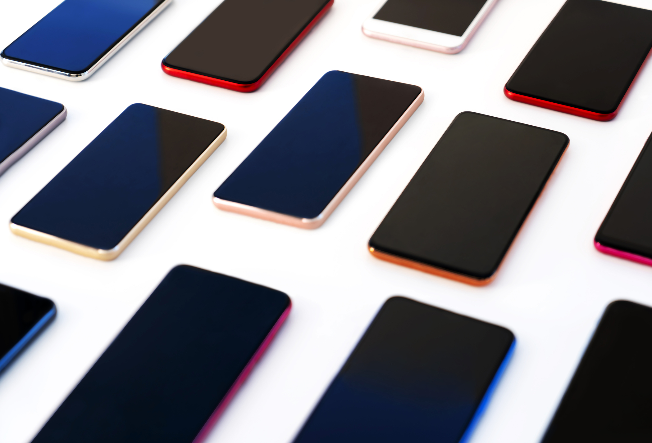 Various smartphones isolated on white