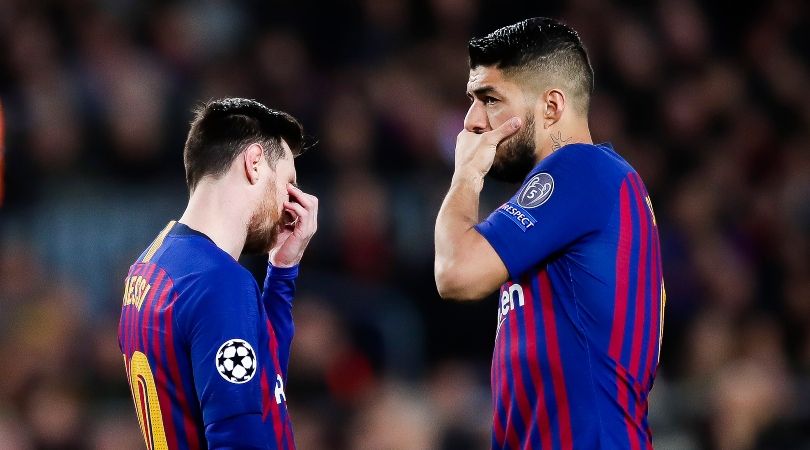 Lionel Messi and Luis Suarez react during Barcelona&#039;s Champions League game against Lyon at Camp Nou in 2019.