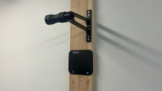 Lezyne CNC Alloy Wheel Hook fixed on wood on a wall
