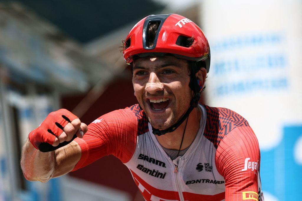 Trek Segafredo&rsquo;s Giulio Ciccone celebrates as he crosses the finish line to win the eighth stage of the 75th edition of the Criterium du Dauphine