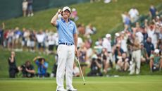 Rory McIlroy victorious on No 18 green during Sunday play at Blue Course of Congressional CC