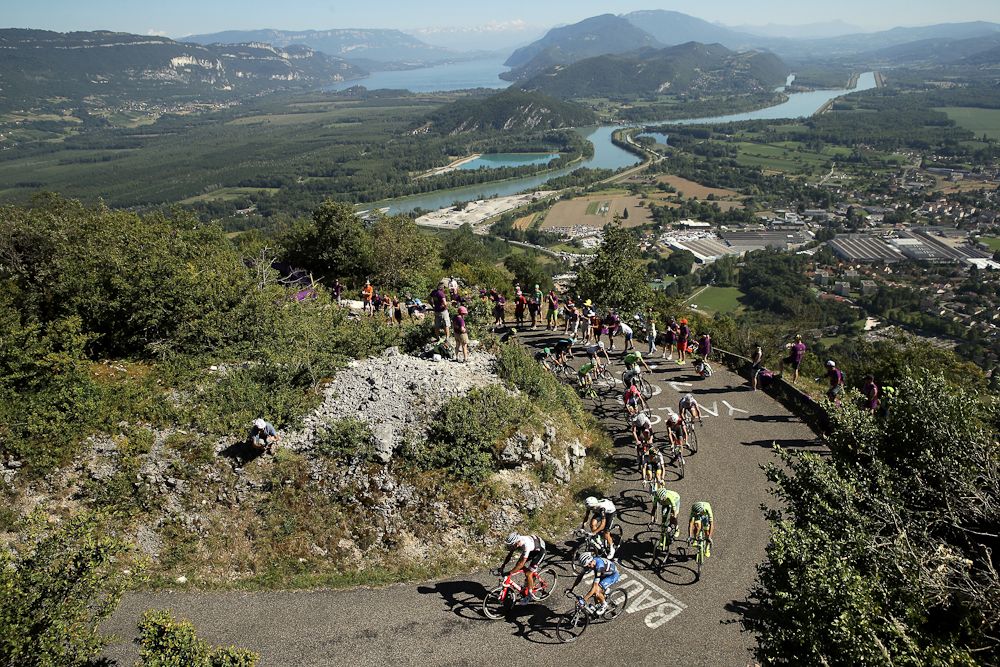 The Tour de France peloton rides through the Pyrenees