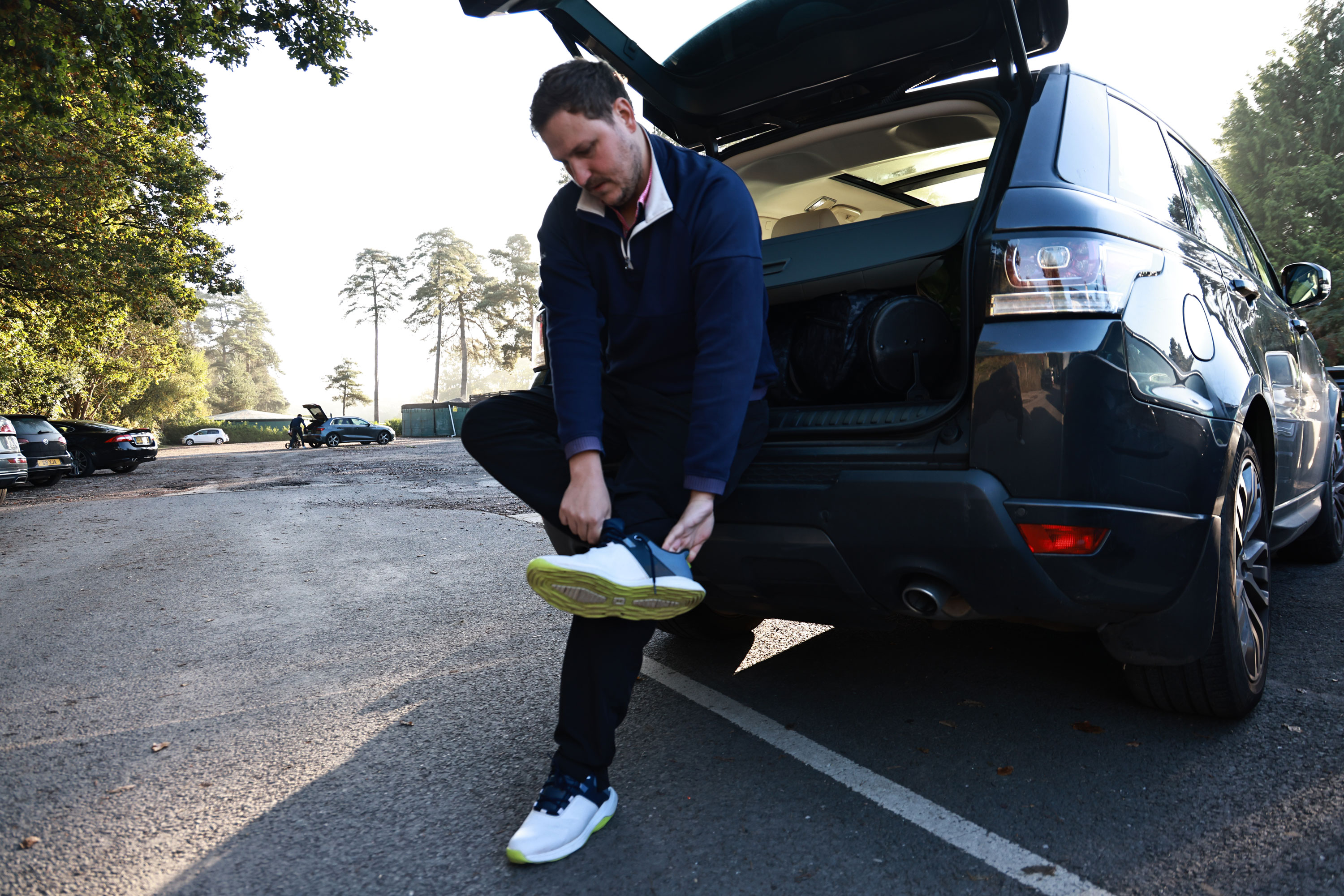 Changing shoes in the car park