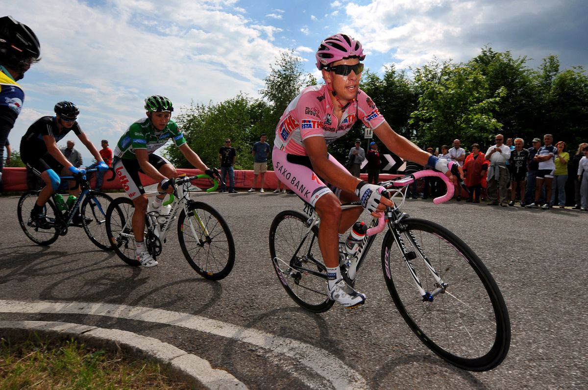 Pink wheel decals, handlebar tape and SRM headunit for Richie Porte in 2010