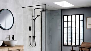 Black ENVi Electric Shower With DuElec Shower Kit in a grey tiled wet room