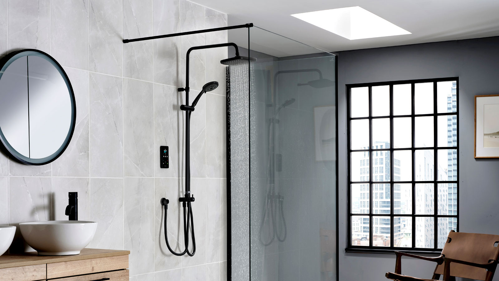 Black ENVi Electric Shower With DuElec Shower Kit in a grey tiled wet room