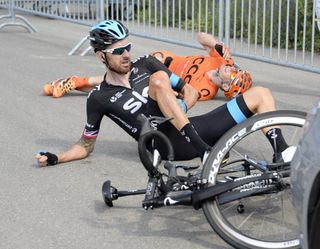 Bradley Wiggins crashes on stage four of the 2014 Tour de Suisse