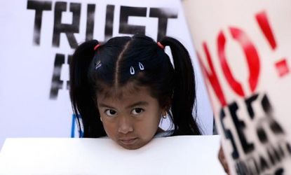 A young pro-immigration protester in Los Angeles on June 26: Republicans may need to soften their stance on immigration if they want to woo Latinos in future elections.