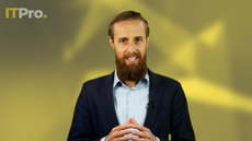 Presenter Ant Joblin on a yellow background talking to the camera