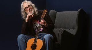 Gordon Giltrap is photographed with his Fylde acoustic – a guitar built in the '70s for his hero, the folk legend Bert Jansch.