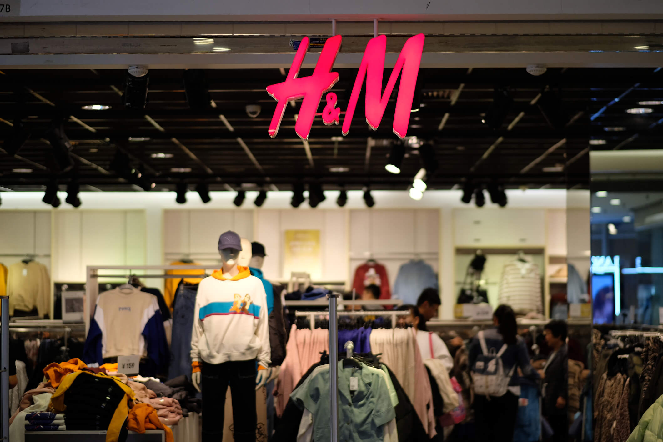The inside of an H&amp;amp;M store with a variety of clothes available