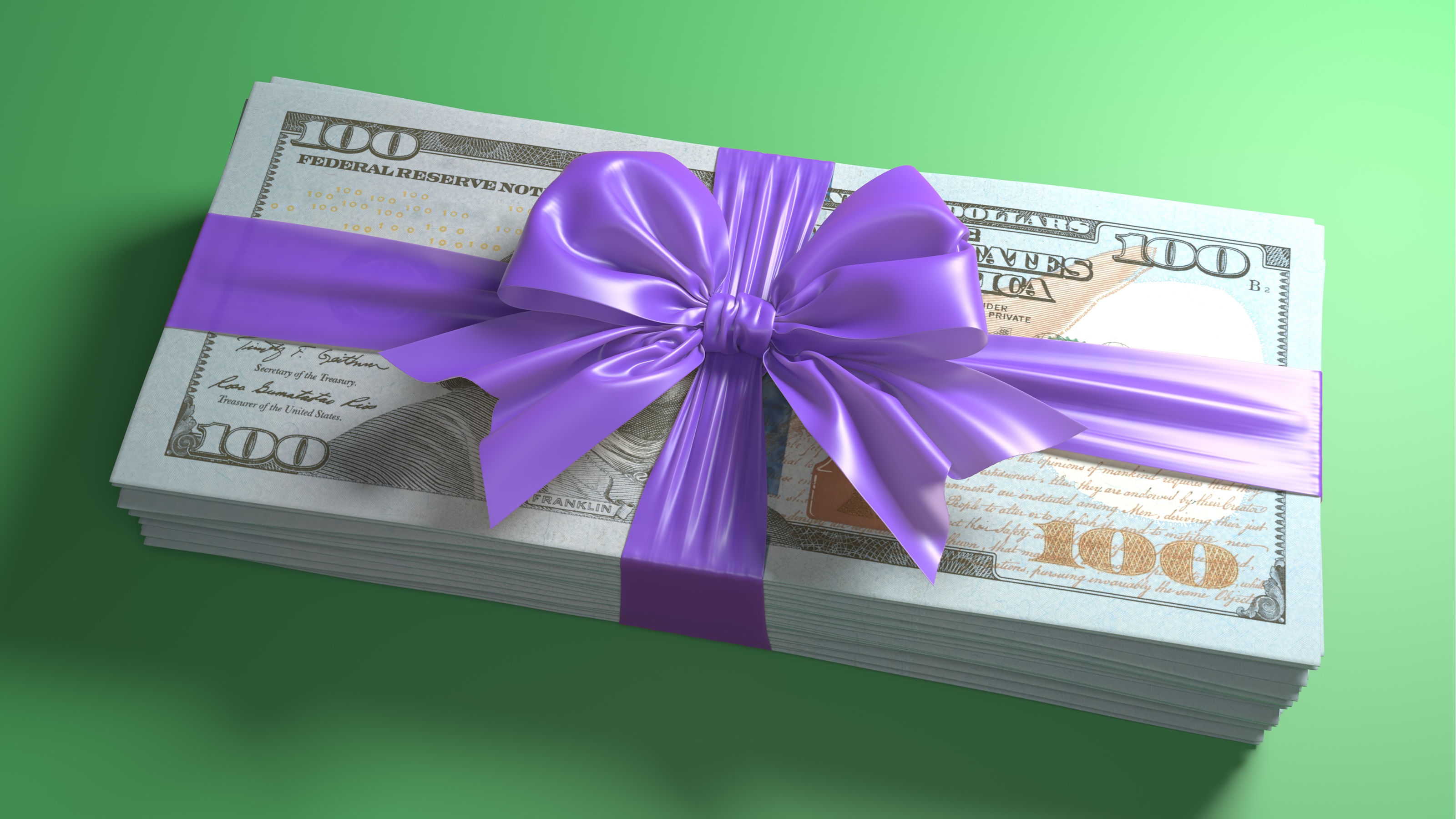 A stock of hundred-dollar bills wrapped in a purple bow.