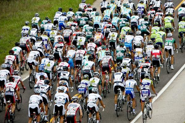 The main group bunches on a climb.