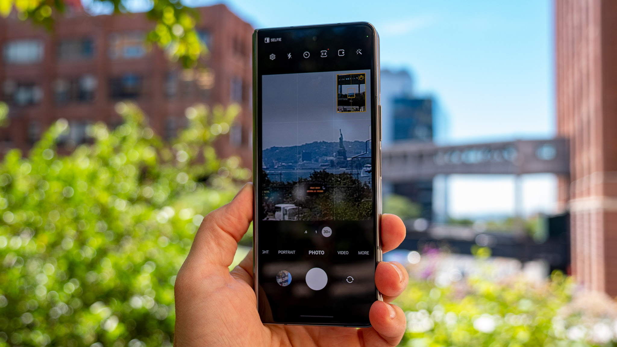 Zooming in 30x on the Samsung Galaxy Z Fold 4's camera to capture a photo of the Statue of Liberty