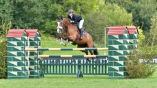 Ariana-Kuligowski-and-Ivascalle-1.20-Amateur-Championship20210911_0891.jpg