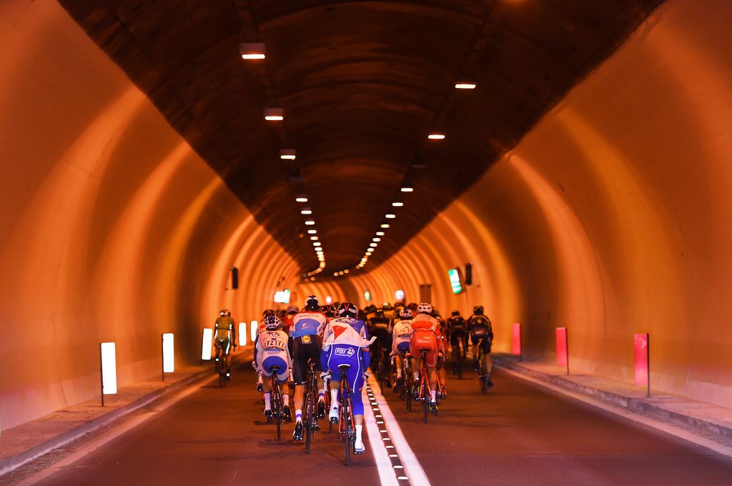The riders enter into a tunnel mid-stage
