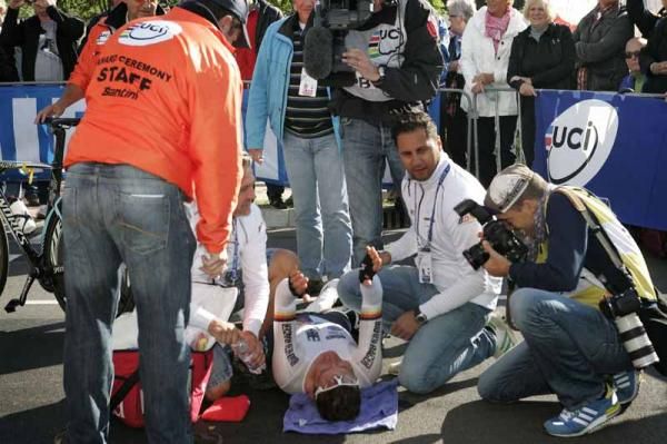 Tony Martin (Germany) lies on the ground in disbelief