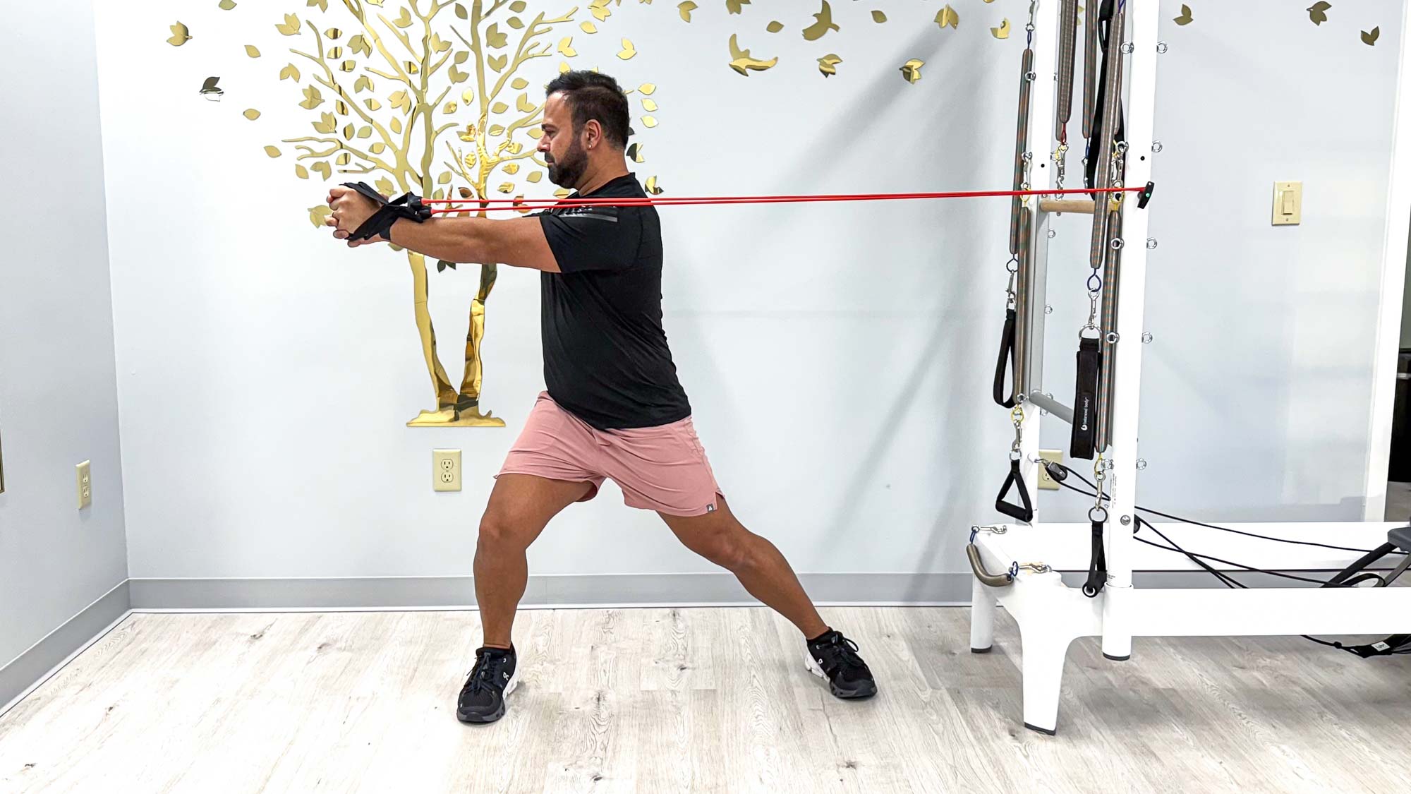 Nico Gonzalez starting the standing lateral core twist exercise