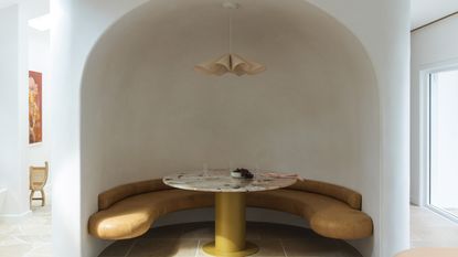 A living room alcove home to a round table