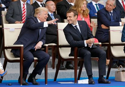 Trump and Emmanuel Macron show love in Paris