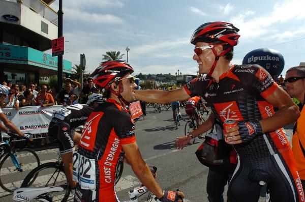 Luis Leon Sanchez is congratulated by his teammate