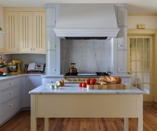 A powder blue and butter yellow kitchen